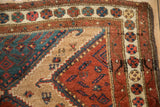Fine floral main border and stepped contour of an antique Persian Hamadan rug corner.