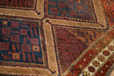 Arrowed finials and stepped lightening contour in camel tones on an antique fine Hamadan rug.