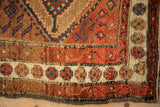 Intact original selvedge and floral top view main border on a fine Persian Hamadan rug.