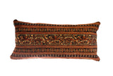 Vintage Persian hand-knotted rug fragment pillow with striped rust, blue, and tan patterns, 13x24 inches.