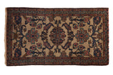 Vintage Persian Mehriban runner rug with a floral bouquet in cobalt blue and terracotta over a beige field.