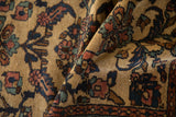A folded view showing the dense, even pile and primitive floral motifs of the Persian rug.
