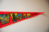 Vintage NYC felt pennant with 'YORK CITY' letters, retro graphics of landmarks.