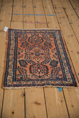 Vintage hand-knotted Lilihan rug corner, terracotta field, sapphire blue millefleur, ivory fringe.
