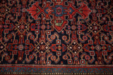 Close-up of a vintage Hamadan rug's mostly even pile, highlighting the traditional Herati design motif.