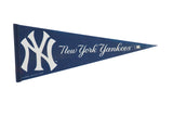 Vintage New York Yankees felt pennant, navy blue with white logo and script.