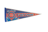 Vintage Detroit Pistons felt flag pennant with 1990s red, white, and blue graphics.