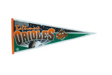 A vintage Baltimore Orioles felt pennant with orange script, green accents, and a classic baseball graphic.