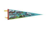 A vintage turquoise felt pennant of Mackinaw City, Michigan, with retro landmark illustrations.