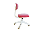 A vintage Okamura swivel desk chair with aged red vinyl upholstery on a retro ivory-cream metal base.