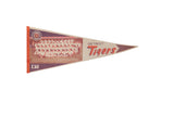 Vintage Detroit Tigers felt pennant with team photo, tiger logo, and orange script on beige and blue.