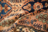 The glossy, silk-like wool pile of a vintage Mehriban rug with floral shrub motifs.
