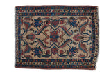 Antique Lilihan rug mat, floral medallion, blue and rose interlaced vines, ivory ground.