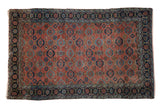Antique hand-knotted Bibikabad rug, copper field, allover Veramin-inspired floral lattice, blue abrashes.