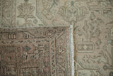 Worn low pile and distinct reverse weave of a distressed vintage Turkish Tabriz carpet.