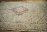 Distressed Turkish Tabriz design carpet border with shield finials and faded Herati motifs.