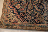 Vintage rug fragment pillow featuring antique Persian Fereghan border and intricate pattern.