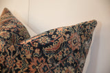 Intricate hand-knotted Persian Fereghan pattern in navy, saffron, and ivory on a vintage pillow.