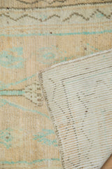 The reverse side of a vintage Turkish Oushak rug reveals its clean, hand-knotted foundation and tight weave.