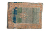Vintage Turkish Oushak rug displaying a prayer design with a lantern in soft jade green, blue, and sandalwood.