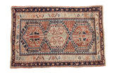 Hand-knotted vintage Anatolian rug with triple gul medallions, geometric blossoms in ivory, terracotta, jade green, and navy blue. 2'9