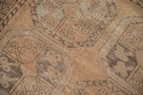 Distressed vintage Ersari rug, highlighting worn pile, pale coffee brown, and floral guls.