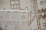 Hand-knotted foundation and distressed pile of the Vintage Oushak rug.