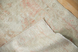 Low pile of vintage Oushak runner, revealing foundation, fringe, dusty blush, ivory.