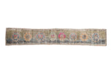Distressed Oushak runner, repeating multi-color floral sampler motifs on worn green abrash, 1'5