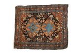 Vintage fine Heriz square rug with a double medallion in shades of aquatic blue, sandalwood, and dark chocolate brown.