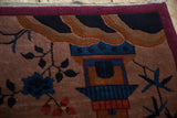 Detail of a pictorial hut and blossom tree on a hand-knotted Art Deco rug.