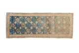 Distressed vintage Oushak runner with sapphire blue to jade green abrashes, diamond floral motifs, 1'8