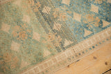 Vintage Oushak rug runner with jade green to sapphire blue abrashes and neutral border.