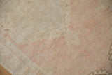 Even wear to knot heads and soft color abrash on a vintage distressed Oushak rug.