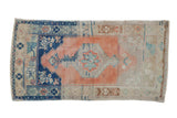 Distressed vintage Oushak rug runner, cantaloupe and cobalt blue, stepped medallion, 2'3