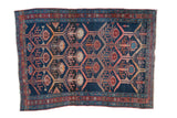 Antique Malayer rug, deep navy field with germinating plant design in madder red, ivory.