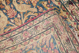 Antique Kerman rug corner showcases hand-knotted foundation, secured side, and pictorial pile.