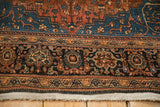 Detailed view of the vintage Josan Sarouk rug's floral border and intact side cord selvage.