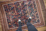 Overhead view showing the scale and vivid color of a hand-knotted antique Persian Afshar rug.