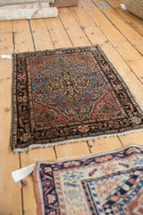 Vintage Farahan Sarouk rug showcasing its traditional geometric pattern and color palette.