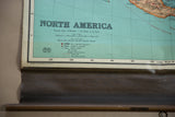 Vintage Nystrom North America map bottom, copyright, scales, stitched backing, and dowel.