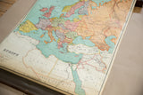 Vintage Nystrom Europe map in muted tones, including Northern Africa and Middle East.