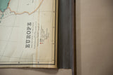 Vintage Nystrom Europe map legend, worn bottom edge, and dark wood dowel.