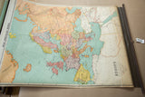 Close-up of vintage A.J. Nystrom pull down map title block and brown dowel.