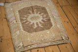 Reverse view of the vintage Kars rug showing its hand-knotted construction and secured end.
