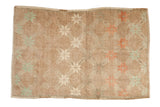 Vintage Distressed Oushak rug, pale mint green, terracotta starbursts, abrashed tan ground.