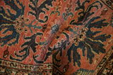 Angled view highlighting the vintage rug's mostly even wear across its knot heads.