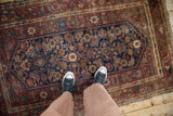 Vintage Hamadan rug, allover Herati design, burgundy, navy, and ivory tones, mostly even wear.