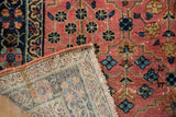 Vintage Lilihan rug's hand knotted foundation, original selvage, and dusty blush pile.