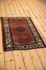 Vintage Persian Engelas rug shown from a high angle, displaying the full traditional layout.